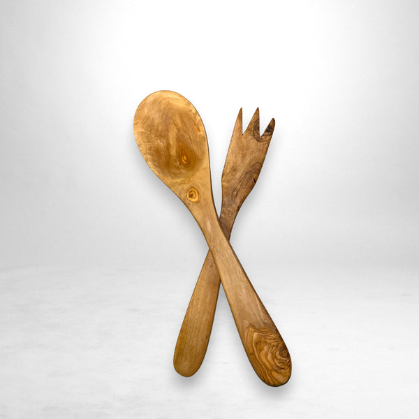 Cutlery with olive wooden salad